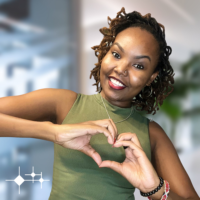 Mutindi Ikami, striking the 'Inspire Inclusion' pose