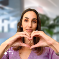 Sarah Stanford, striking the Inspire Inclusion Pose